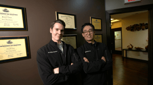 Dr. Nudera and Dr. Chon posing together in hallway