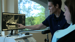 Dr. Nudera showing patient X-ray